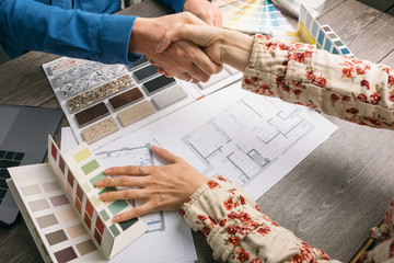 Approval of the project. successful work. Shaking hands. Work of designer and client Agreement. ....