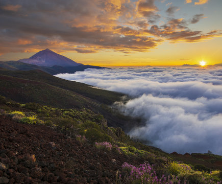 spectacular sunset above the clouds in the Teide volcano national park in Tenerife