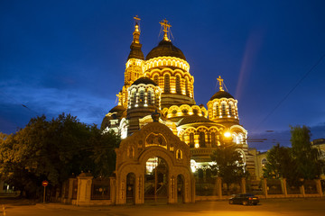 Fototapeta na wymiar church illuminated against the background of the night sky, Kharkov, Ukraine