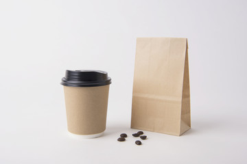 Blank brown paper bag and coffee cup for mockup template advertising and branding background.