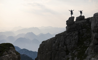 people in yoga position, peace and therapy in high mountains