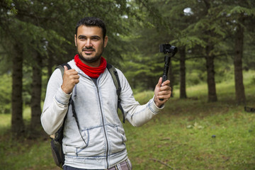 Youtuber, vlogger in the jungle