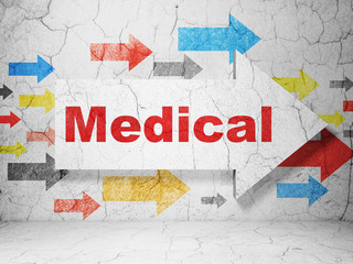 Healthcare concept:  arrow with Medical on grunge textured concrete wall background, 3D rendering