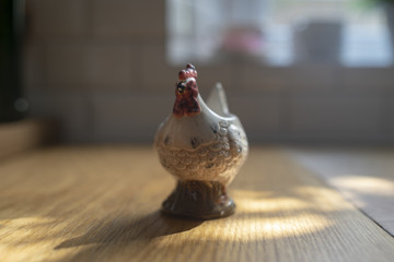 Chicken egg cup on wooden table