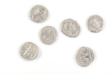 Roman denarius lie on a white background, the era of the Antonines, Marcus Aurelius, Antoninus Pius, Commodus, Caesar