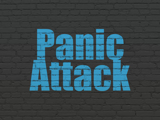 Fototapeta na wymiar Health concept: Painted blue text Panic Attack on Black Brick wall background