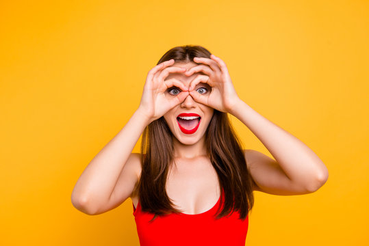 What?! Wow omg! Fun joy people person season sale discount concept. Close up photo portrait of funny funky crazy mad astonished beautiful lady making eyewear fingers hands isolated bright background