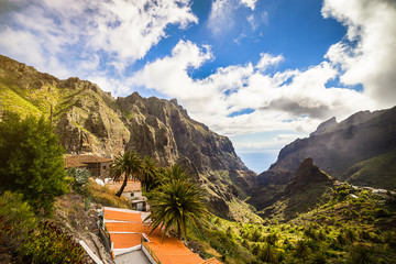 Fototapeta na wymiar Mountain Landscape of the Masca Gorge. Beautiful views of the coast with small villages in Tenerife, Canary Islands