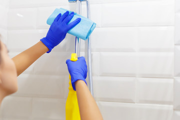 Housekeeper cleaning a hotel room