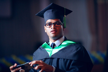 portrait of graduate student on graduation ceremony