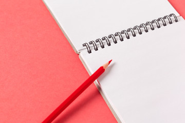 Blank paper pieces  on a colored pink background