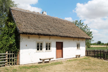 Fototapeta na wymiar old white wooden house - polish village