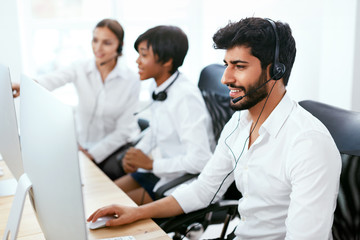 Fototapeta premium Operators Working On Hotline In Call-Center