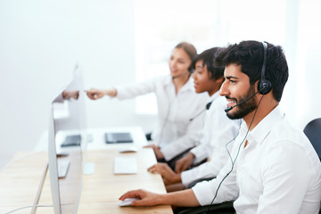 Operators Working On Hotline In Call-Center