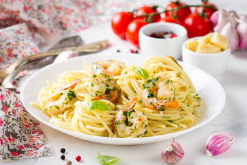 Italian pasta, spaghetti with shrimp, herbs, garlic and cheese. Tasty healthy food