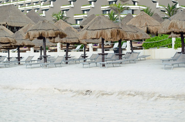 Hay dry grass umbrella at beach. Relax, shade