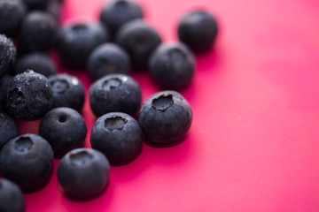 Close up fresh ripe wild blueberries in top view with copy space for background. antioxidant food and vitamin C. Healthy and delicious fruits