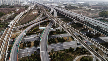 Fototapeta premium Aerial view of railway, highway and overpass on Luoshan road, Shanghai