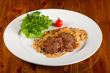Beef with mushroom sauce