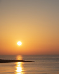 Obraz premium Beatiful sunrise at sea coast