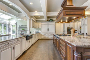 Stunning kitchen room design with large bar style island.