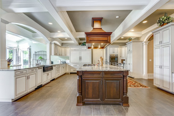 Stunning kitchen room design with large bar style island. - obrazy, fototapety, plakaty