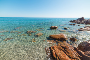Rocks and blue sea in Perdepera shore