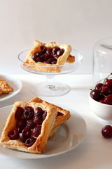 Freshly baked puff pastry with cherries