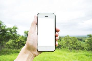 Young man is using the phone to surf the internet. And can play around the world. Internet Key