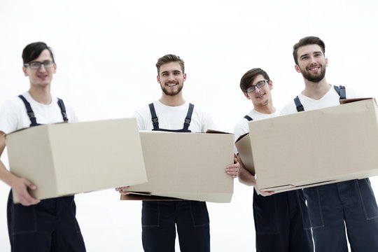 photo workers holding boxes when moving flats,