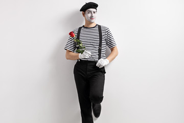 Mime with a rose flower