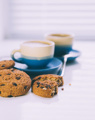hot coffee, chocolate and cookies in morning