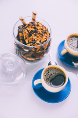 hot coffee, chocolate and cookies in morning