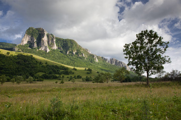 trascau mountains with piatra secuiului over the village of Rimetea - famous destination in Transylvania, Romania