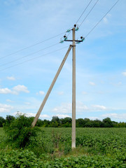 electric wires on a support in a blue sky