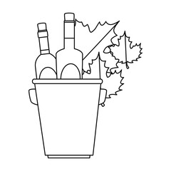 wine bottles in bucket with leafs