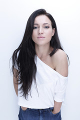 Fototapeta premium Portrait of a stylish smiling young woman