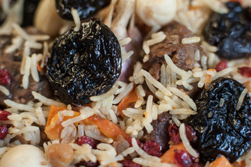 Rice with prunes, carrot, onion and meat