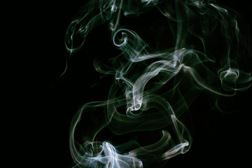 White smoke on black background and film filter