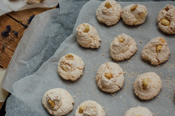 Baking tray with delicious coconut macaroons. Closeup