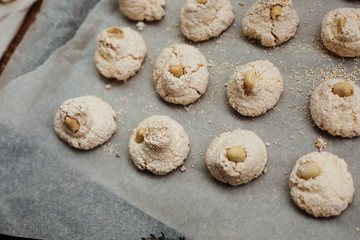 Baking tray with delicious coconut macaroons. Closeup