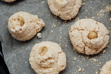 Baking tray with delicious coconut macaroons. Closeup