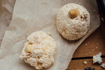 Baking tray with delicious coconut macaroons. Closeup
