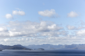 White Clouds Floating On The Lake