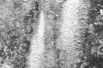 Wall fragment with scratches and cracks