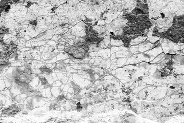 Wall fragment with scratches and cracks