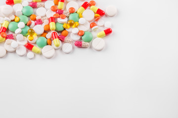 A lot of pills and vitamins. Copy space. The concept of medicine, disease, health.