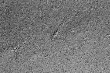 Wall fragment with scratches and cracks