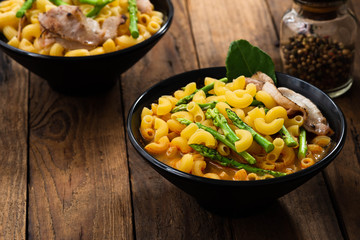 tom yam soup pasta on wood


