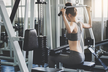 Fitness woman doing exercise in gym
